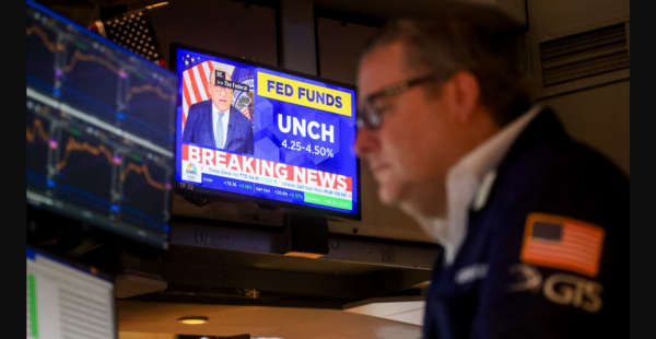 Stocks Soar as Fed Holds Steady, Signals Future Rate Cuts