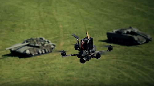 AI Drone Swarms Reshape Battlefield Combat, US Hiring Slows After Tariffs, Ellison Heir Eyes Warner Bros