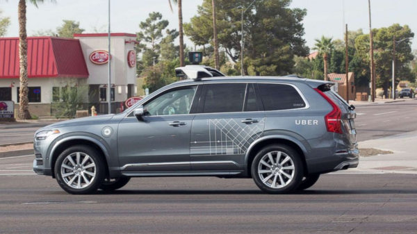 Uber Halts Arizona Self-Driving Tests After Fatal Crash, Hires Safety Adviser